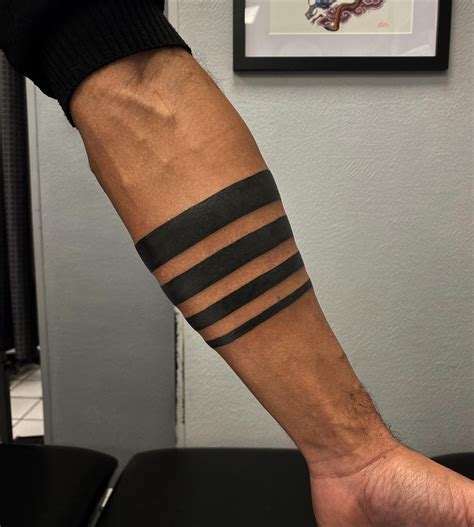 band tattoo forearm